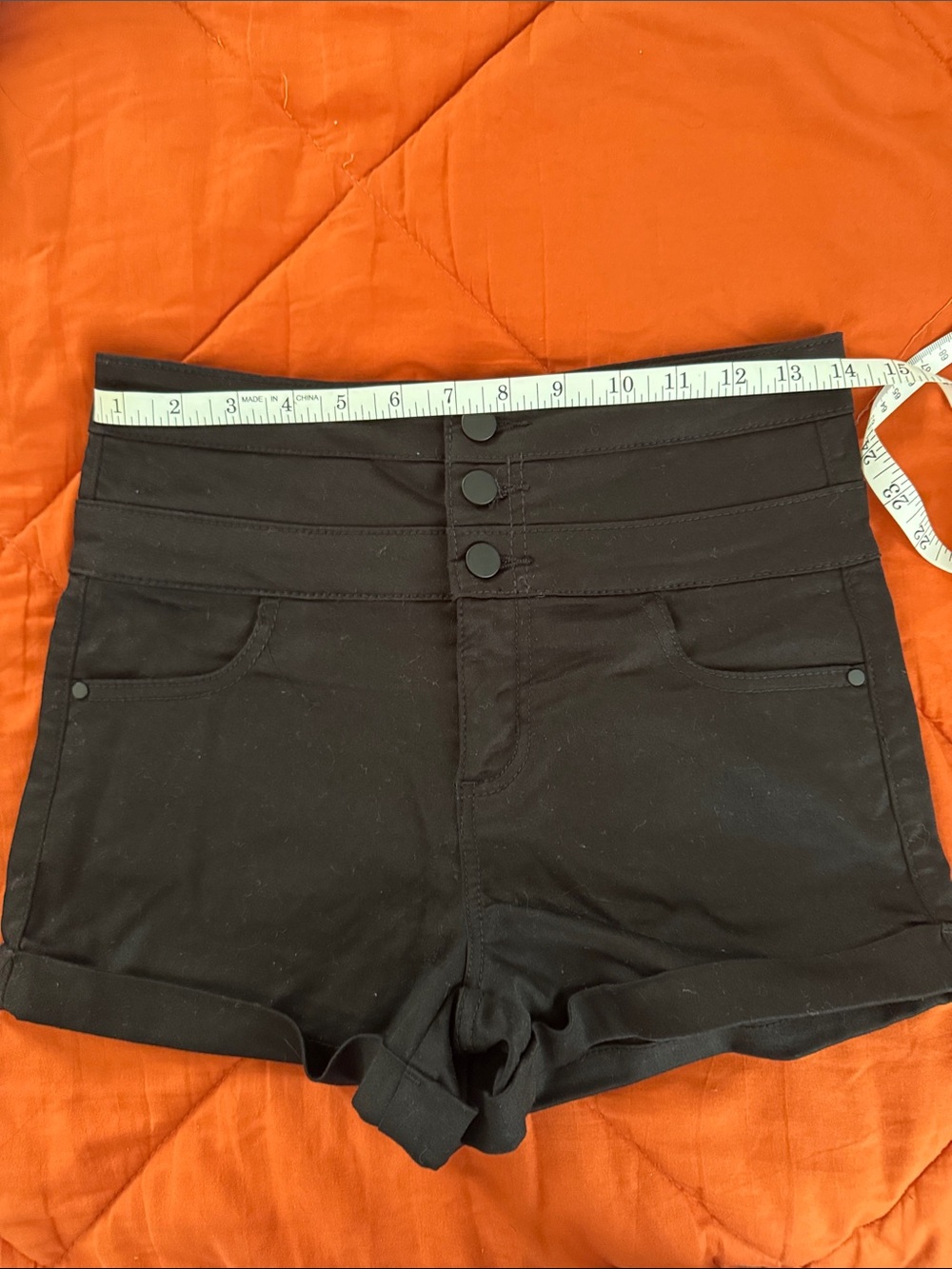 lFire High-Waist Black Shorts with Triple Button Detail